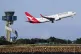 A Qantas Boeing 737 passenger plane takes off from Sydney Airport, Australia, Sept. 5, 2022