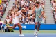 Carlos Alcaraz (right) of Spain, and Emma Raducanu (left) of Great Britain, celebrate during their mixed doubles match at the U.S. Open tennis championships, August 19, 2025, in New York