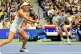 Jessica Pagula (left) of the United States, plays with Jack Draper (right) of Great Britain, during the mixed doubles semi final at the U.S. Open tennis championships, August 20, 2025, in New York