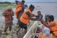 In this photo released by Pakistan's National Disaster Management Authority, rescue workers evacuate villagers from a low-lying area due to rising water level in the Sutlej River following neighbouring India released water from overflowing dams, in Bahawalnagar a district in Pakistan's Punjab province