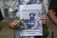 Protesters hold placards during a demonstration held by the London Freelance branch of the National Union of Journalists to honour journalists killed in Gaza, opposite Downing Street in London, August 27, 2025