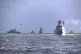 In this photo released by Xinhua News Agency, Chinese and Russian warships take part in a joint naval drills in the East China Sea, December 27, 2022
