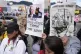 Opponents of former President Alvaro Uribe gather outside the court on the day he was sentenced to 12 years under house arrest for witness tampering and bribery in Bogota, Colombia, August 1, 2025