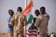 FLAGGING POWER OF THE WEST: Nigerian and US soldiers raise their respective flags at a US military base in the country in 2018; last year, at the demand of the new transitional government of General Abdurahmane Tchiani, all US troops left. Photo: Africom
