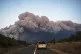 Cars drive past a fast-moving wildfire in a Mediterranean region of France near the Spanish border is pictured, August 5, 2025. Photo: Richard Capoulade/UGC via AP