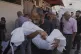 Ahmed Al-Hajj carries the body of his daughter, Dana Al-Hajj, 13, who was killed in an Israeli airstrike in the Gaza Strip, at Al-Aqsa Hospital in Deir al-Balah, August 19, 2025
