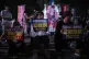 Protesters sit outside the Atomic Bomb Dome ahead of the memorial service to mark the 80th anniversary of the WWII U.S. atomic bombing in Hiroshima, August 6, 2025, in Japan