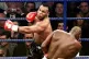 American boxer Mike Tyson (left) throws a punch at Briton's Julius Francis, during their heavyweight fight at the MEN Arena, Manchester