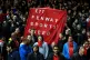 Liverpool fans protest against against Fenway Sports Group and the ticket prices in the stands during the Emirates FA Cup, fourth round replay match at Upton Park, London