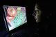 A woman uses an internet gambling website to play online roulette