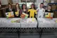 Then children's minister Maree Todd helps fill boxes alongside young people who were all involved in the new design of the baby box as its unveiled at the APS Group in Edinburgh, March 2019