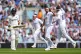 England's Gus Atkinson (centre right) celebrates the wicket of India's Washington Sundar (left) with Ollie Pope (right) on day two of the Fifth Rothesay Men's Test at the Kia Oval, London, August 1, 2025