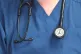A Doctor holding a stethoscope at the Royal Liverpool University Hospital, Liverpool