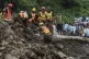 Rescue workers search victims through the rubble of damaged homes following Monday's flash flooding due to heavy rains, in Dalori village in Swabi, a district of Pakistan's Khyber Pakhtunkhwa province, August 19, 2025