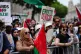 People listening to speakers in Whitehall after a march organised by the Palestine Solidarity Campaign, from Russell Square to Whitehall in central London, June 21, 2025