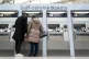 People using a ticket machine at Waterloo train station in London