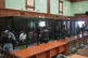 Suspects accused of involvement in a terror attack in the Crocus City Hall on March 22, 2024, sit in a glass cage prior to a hearing in the 2nd Western District Military Court in Moscow, Russia, August 4, 2025