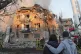 Firefighters work at the site of a burning building after a Russian attack in Kyiv, Ukraine, August 28, 2025