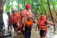 In this handout provided by the Philippine Coast Guard, rescuers move residents to safer grounds as floods rise due to Tropical Storm Bualoi in Bacolod city, Negros Occidental province, Philippines Friday, Sept. 26, 2025