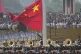 The Chinese flag is raised ahead of a military parade to commemorate the 80th anniversary of Japan's World War II surrender held in front of Tiananmen Gate in Beijing, September 3, 2025