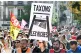 NOT BUDGING AN INCH: A rally of the ‘Block Everything’ movement in Strasbourg, eastern France on Wednesday, the placard that reads: ‘Let's tax the rich,’ and the guillotine adds a telling historic context
