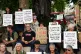 People take part in a protest in support of Palestine Action, organised by the Defend Our Juries group, in front of the Mahatma Gandhii statue in Parliament Square, central London, July 5, 2025