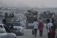 Displaced Palestinians fleeing northern Gaza Strip move with their belongings along the Sea Road, in Gaza City, September 1, 2025