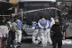 Israeli police and rescue teams inspect the scene of a shooting attack carried out by two Palestinian gunmen, in which several people were killed and others injured at a bus stop in Jerusalem, Sept ember 8, 2025