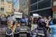 Demonstrators hold up placards reading 