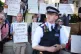 People take part in a protest in Parliament Square, London, July 12, 2025