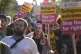 People take part in the Stand Up To Racism rally near the TLK Apartments and Hotel in Orpington, August 22, 2025