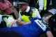 Police officers remove a protester as demonstrators take part in a Lift the Ban on Palestine Action protest organised by Defend our Juries in Parliament Square in London. Picture date: Saturday September 6, 2025