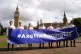 Jockeys Kieran Shoemark, Oisin Murphy, Saffie Osborne, Lily Pinchin, Richard Johnson, Hollie Doyle, Tom Marquand and Paul O'Brien (left-right) hold up an Axe The Racing Tax banner in Parliament Square, Westminster, London, September 10, 2025