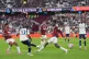 Tottenham Hotspur's Mohammed Kudus (second left) has a shot at goal during the Premier League match at the London Stadium, London, September 13, 2025