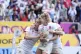 England's Ellie Kildunne (centre) celebrates with team-mates after scoring a try during the Women's Rugby World Cup 2025 semi-final match at Ashton Gate, Bristol, September 20, 2025