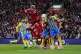 Liverpool's Hugo Ekitike and Southampton's Ryan Manning attack the ball from a corner during the Carabao Cup third round match at Anfield, Liverpool, September 23, 2025