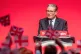 People wave flags as Prime Minister Sir Keir Starmer delivers his keynote speech during the Labour Party Conference at the ACC Liverpool. Picture date: Tuesday September 30, 2025