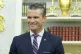 Defense Secretary Pete Hegseth listens as President Donald Trump speaks during an event signing a proclamation honoring the fourth anniversary of the attack at Abbey Gate in Afghanistan, in the Oval Office of the White House, August 25, 2025