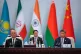 Chinese President Xi Jinping (right) gives a speech during the Shanghai Cooperation Organization (SCO) summit at the Meijiang Convention and Exhibition Center in Tianjin, China, September 1, 2025