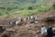 In this September 1, 2025, photo provided by the Sudan Liberation Movement/Army, people gather at the site of a landslide from August 31, that wiped out the village of Tarasin in the Marrah Mountains of Central Darfur, Sudan. Photo: Sudan Liberation Movement/Army via AP