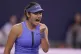 Emma Raducanu, of Britain reacts after scoring a break point against Jessica Pegula, of the United States during the women's singles match for the China Open tennis tournament, in Beijing, September 29, 2025