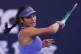 Emma Raducanu, of Britain plays a forehand return to Jessica Pegula, of the United States during the women's singles match for the China Open tennis tournament, in Beijing, September 29, 2025