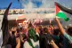 People welcome a number of activists who took part in the Global Sumud Flotilla that attempted to sail to Gaza after they were released from Israeli prison, at Tunis–Carthage International Airport, October 5, 2025, in Tunis, Tunisia