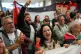 Pro-Palestinians protesters chants slogans as they wait for Swedish activist Greta Thunberg to arrive at the Eleftherios Venizelos International Airport in Athens, October 6, 2025