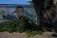 Murals of former Venezuelan President Hugo Chavez cover a wall in Caracas, Venezuela, October 16, 2025