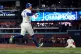 Toronto Blue Jays' George Springer (4) and Vladimir Guerrero Jr. celebrate after the final out of Game 7 of baseball's American League Championship Series, October 20, 2025, in Toronto. Photo: Nathan Denette/The Canadian Press via AP