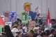 Protesters hold signs during a demonstration against US President Donald Trump's attendance at the Association of Southeast Asian Nations (Asean) Summit in Kuala Lumpur, Malaysia, October 26, 2025