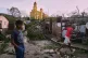 Boys walk in El Cobre, Cuba, in the aftermath of Hurricane Melissa, October 29, 2025