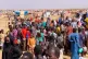 This photo released by The Norwegian Refugee Council (NRC), shows displaced families from el-Fasher at a displacement camp where they sought refuge from fighting between government forces and the RSF, in Tawila, Darfur region