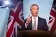Reform UK leader Nigel Farage reacts to the speech by Prime Minister Sir Keir Starmer at the Labour Party conference, during a photocall at the Reform UK headquarters in Westminster, London, September 30, 2025